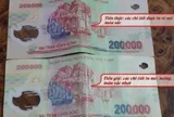 Tiền giả 200.000 đồng xuất hiện trở lại: Cách phân biệt để tránh bị lừa